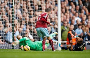 Football - West Ham United v Manchester City - Barclays Premier League - Upton Park - 25/10/14 Morgan Amalfitano scores the first goal for West Ham Mandatory Credit: Action Images / John Sibley Livepic EDITORIAL USE ONLY. No use with unauthorized audio, video, data, fixture lists, club/league logos or "live" services. Online in-match use limited to 45 images, no video emulation. No use in betting, games or single club/league/player publications.  Please contact your account representative for further details.